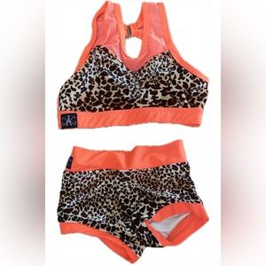 Kandi Kouture Dancewear Set
Leopard print and bright orange top with shorts